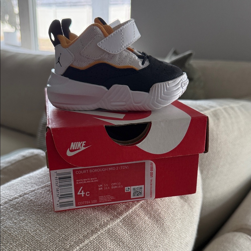 Nike Kids Sneakers - Black, White, and Gold